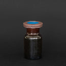 Frasco de vidro ambar